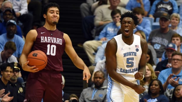 Jan 2, 2019; Chapel Hill, NC, USA; North Carolina Tar Heels forward Nassir Little (5) reacts after drawing an offensive foul from Harvard Crimson guard Noah Kirkwood (10) during the second half at Dean E. Smith Center. The Tar Heels won 77-57. Mandatory Credit: Rob Kinnan-USA TODAY Sports